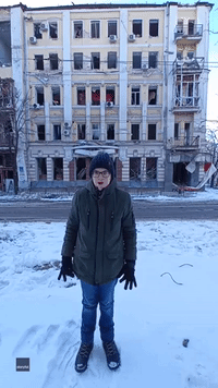 Young Guitarist Performs in Ruins of Historic Kharkiv Building