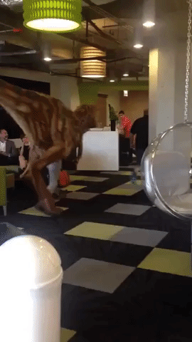 Office Employees Terrified by Roaming Dinosaur