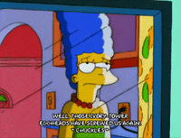 chuckling homer simpson GIF