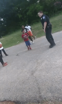 Alabama Cop Takes Time Out to Shoot Hoops With Local Kids