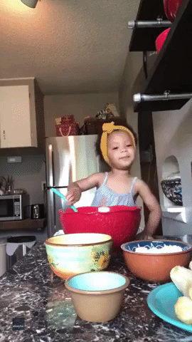 Jesus First, Baking Second: Little Girl Raises Arms in Worship Before She Bakes Banana Bread
