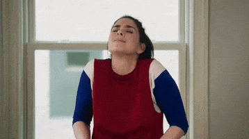 Celebrity gif. Sarah Silverman scrunches up her shoulders and face and shakes it all out, sticking out her tongue as if she's getting rid of something gross.