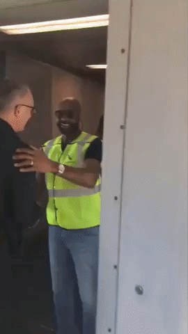 49ers Legend  Jerry Rice Greets Passengers at Miami Airport Ahead of Super Bowl