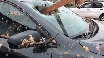 Timber Beam Smashes Through Car Windscreen in Jefferson City Tornado