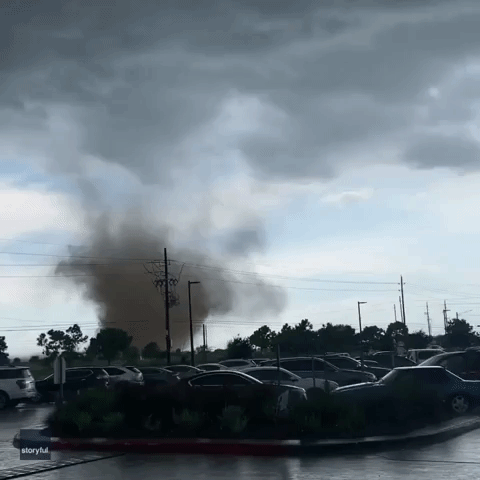 Landspout Tornado Forms Near Parking Lot in Cypress, Texas
