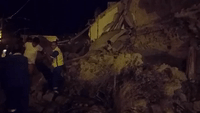 Ischia Quake Survivors Walk Over Rubble to Safety
