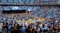 Delighted Tar Heels Fans Flood Onto Court After Final Four Victory Over Duke