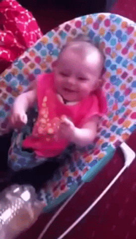 Rhythmic Bottle Gives Baby Girl a Fit of the Giggles