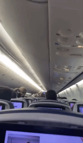 Airline Passengers Cheer End of Mask Mandate