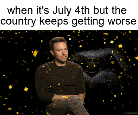 Celebrity gif. Ben Affleck sits and stares blankly without emotion as gold confetti falls down around him. Caption, “When it’s 4th of July but the country keeps getting worse.”

