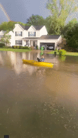 Residents Kayak Through Flooded Ohio Neighborhood