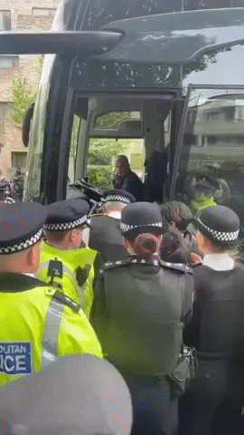 Police Intervene as Protesters Block Bus Sent to Relocate London Migrants