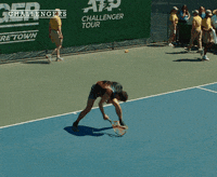 Movie gif. A shot from the movie "Challengers." Patrick Zweig repeatedly slams his tennis racket on the court in anger. 