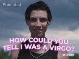 Sponsored gif. Person stands in front of a stormy sky background, looking at us with a smile and an expression that's eager or hopeful. Three drawn animations appear around them, moving slightly: a smiley face, cluster of sparkling stars, and a shimmering star. Text reads, "How could you tell I was a Virgo?" with the Tinder logo in the bottom right corner.