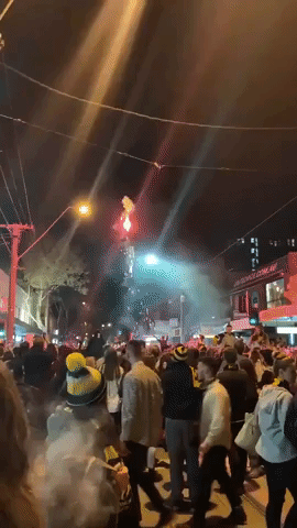 Jubilant Tigers Fans Celebrate on Melbourne's Swan Street