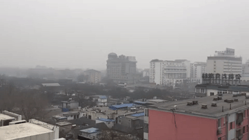 Beijing Skyline Barely Visible as Pollution Hits 'Red Alert' Level