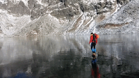 Hikers Walk on Crystal Clear Ice in Slovak Mountains