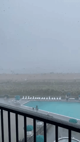 Beach Umbrellas Blown Into the Ocean as Severe Weather Hits Coastal Delaware