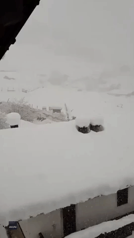 Snow and Debris Engulf Italian Town
