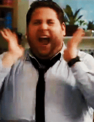 Movie gif. Jonah Hill, as Aaron in Get Him to the Greek, screaming and bobbing left and right with excitement.
