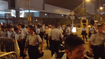 Police Assemble Outside Government Headquarters
