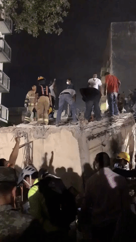 Rescue Workers Search for Survivors in Rubble After Mexico City Earthquake