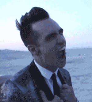 a rocket to the moon breaking up GIF