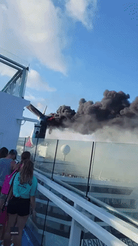 'That Is Wild': Carnival Cruise Ship Catches Fire While Docked in Grand Turk