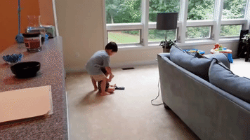 Big Brother Helps Adorable Sister Learn How to Walk