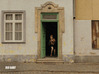 SearchlightPics happy jump for joy jojo rabbit jojorabbit GIF