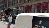 UPS Driver Honks Horn in Solidarity With Picket Line Outside Netflix in New York