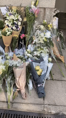 Mourners Lay Flowers Outside British Consulate in Hong Kong