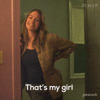 Sponsored gif. Video of Yvonne Strahovski as Maggie Chenoweth on Teacup leaning on a door jamb and saying with a smile, "That's my girl." Text, "That's my girl." The Peacock logo in the bottom right hand corner.