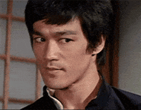 Bruce Lee Smirk GIF