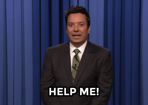 Tonight Show gif. In front of a blue curtain, Jimmy speaks to us stiffly with a blank stare. Text, "Help me!"
