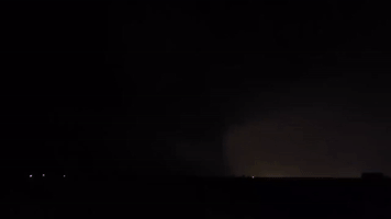 Funnel Cloud Illuminated By Lightning Amid Tornado Warning in Central Oklahoma