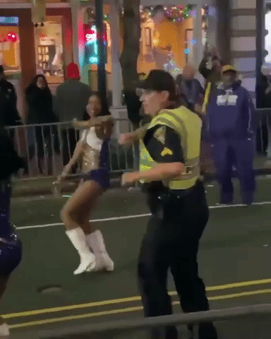Police Officer Shows Off Dance Moves at Mardi Gras