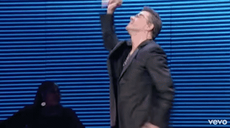 georgemichael giphyupload feeling good george michael giphygmfeelinggood GIF