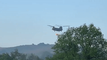 RAF Helicopter Joins Efforts to Shore Up Damaged Dam in Whaley Bridge