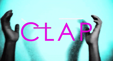 Video gif. From a Fitz and the Tantrums music video, we see a continuous loop of two hands clapping in front of a white wall with the text, “CLAP.”