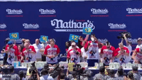 Joey Chestnut Grabs Protester at Hot Dog Contest