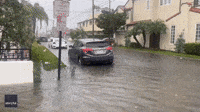 Floodwaters Swamp Streets of Long Beach Amid Atmospheric River Storm