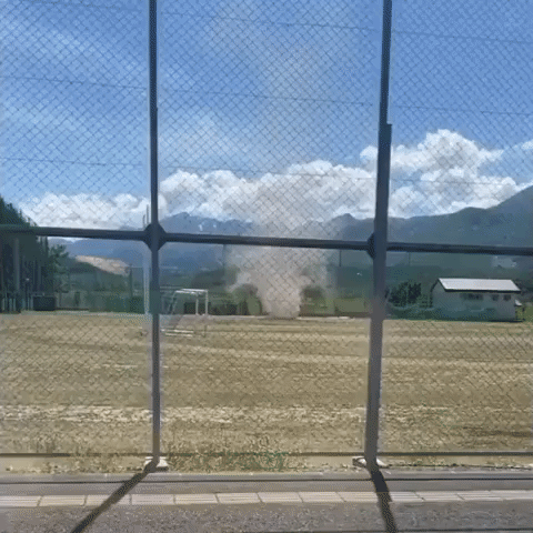 Dust Devil Swirls at High School Sports Field in Hokkaido