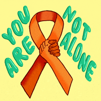 Text gif. Orange commemorative ribbon completed by two arms in a G-Lock handshake. Text, "You are not alone" against a light yellow background.