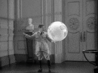 charlie chaplin hitler GIF