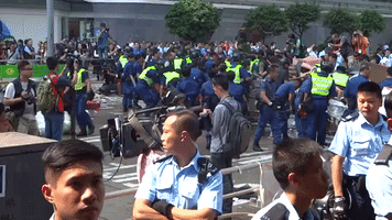 Hong Kong Police Take Down Protester Barricades