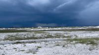 Waterspout Looms Over Florida's Pensacola Bay as Lightning Strikes