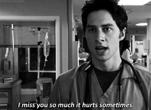 TV gif. Zach Braff as J.D. in Scrubs. In black and white, he stares us down with full compassion and intention as he says, "I miss you so much it hurts sometimes."