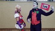 JoelXero1 laugh laughing joker harley quinn GIF