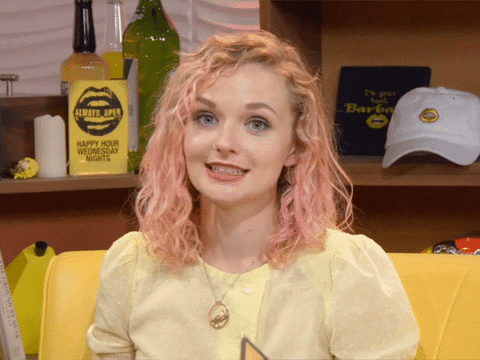 Video gif. Ellie Main on the Always Open podcast takes a deep breath and sighs disappointedly while looking directly at us. Text reads, "Sighs."